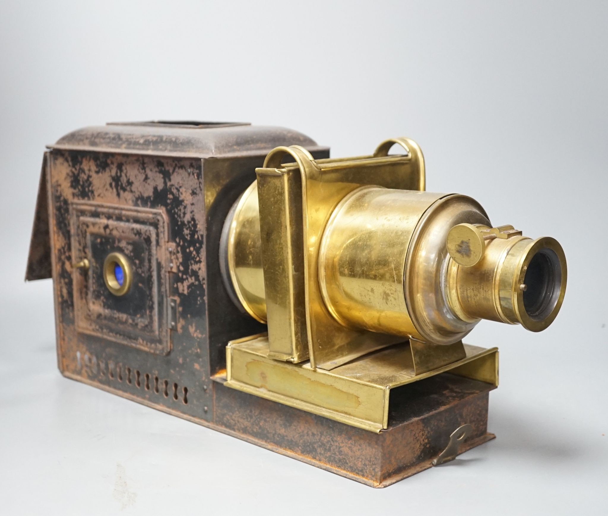 A cased tinplate and pressed brass Magic Lantern, Case 46 cm long